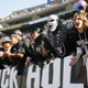 Fans of the Oakland Raiders cheers against the Houston Texans during the game on December 3, 2006 at McAfee Coliseum in Oakland, California.